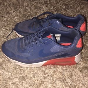 Navy blue/purple & orange Nike Air Max’s.